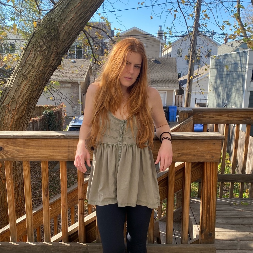 Free people babydoll top in army green.